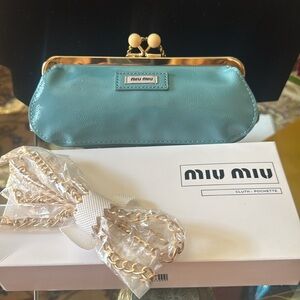Miu Miu kiss lock clutch bag (perfume ) Leather like  Clutch or shoulder bag
